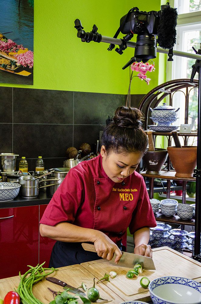 Pratina Kross preparing yellow curry with chicken